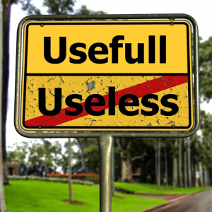 A roadsign with the place names 'Usefull' and 'Useless' on it, representing effectiveness and ineffectiveness